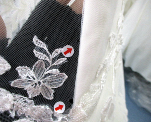 Found holes on bridal gowns inspection
