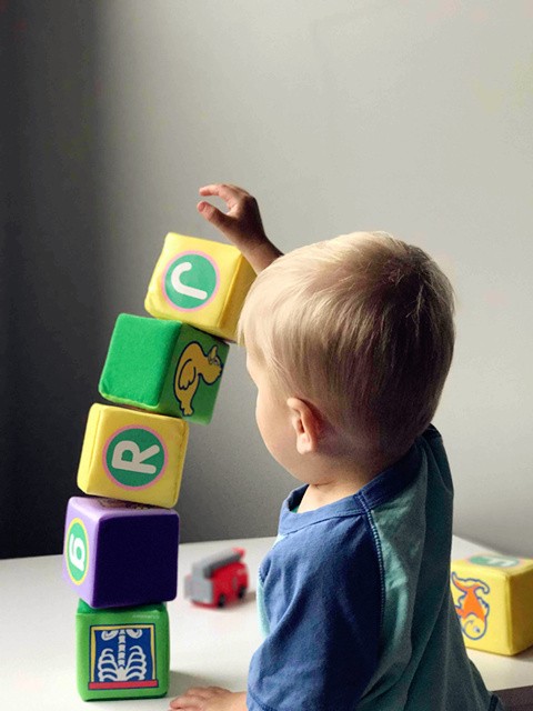 kids playing toys and raw materials testing