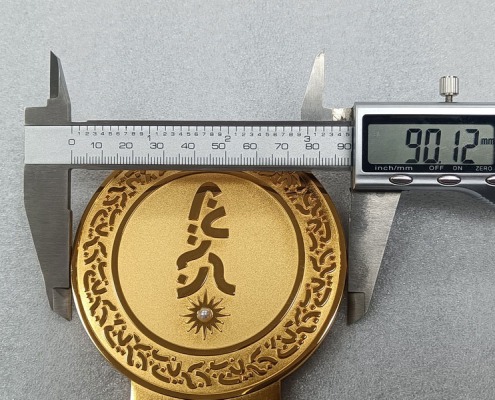 metal badge quality control_Digital caliper measuring metal badge diameter