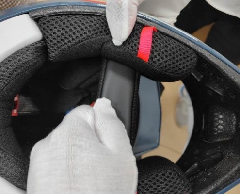 tension test in motorcycle helmet inspection